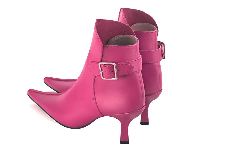 Fuschia pink women's ankle boots with buckles at the back. Pointed toe. High spool heels. Rear view - Florence KOOIJMAN